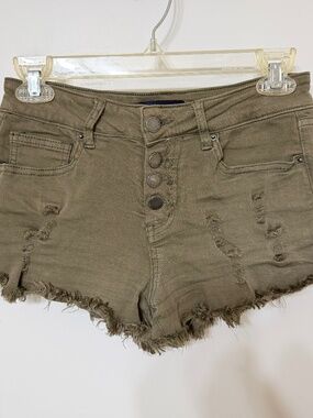 Army green ripped shorts
